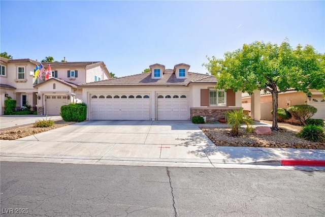 270 New River Cir, Henderson, NV 89052 - view of front of home featuring stucco siding, a garage, driveway, and stone siding