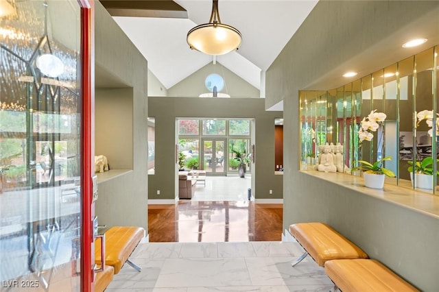 3004 Astoria Pines Cir, Las Vegas, NV 89107 - entryway with baseboards, marble finish floors, and high vaulted ceiling