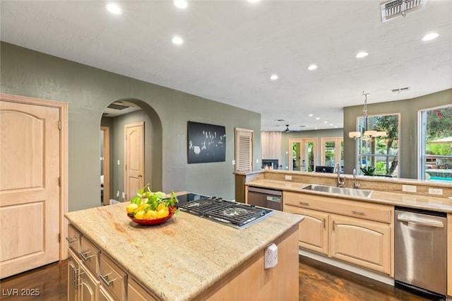 3004 Astoria Pines Cir, Las Vegas, NV 89107 - kitchen featuring a sink, recessed lighting, stainless steel appliances, light brown cabinets, and a center island