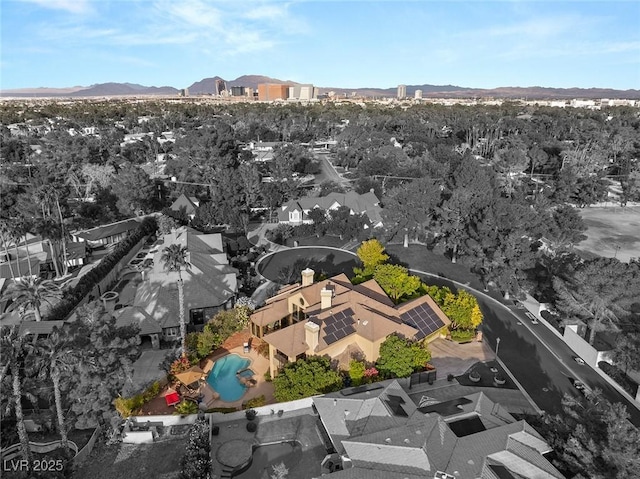 3004 Astoria Pines Cir, Las Vegas, NV 89107 - aerial perspective of suburban area with a pool and a mountainous background