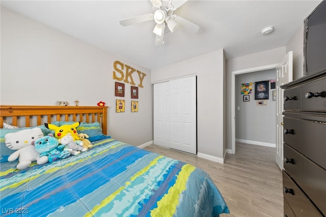8316 Joseph Cary Ct, Las Vegas, NV 89145 - bedroom featuring light wood-style flooring, a closet, baseboards, and ceiling fan