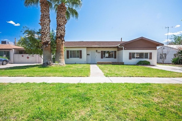 633 5th St, Boulder City, NV 89005 - ranch-style house featuring a front lawn