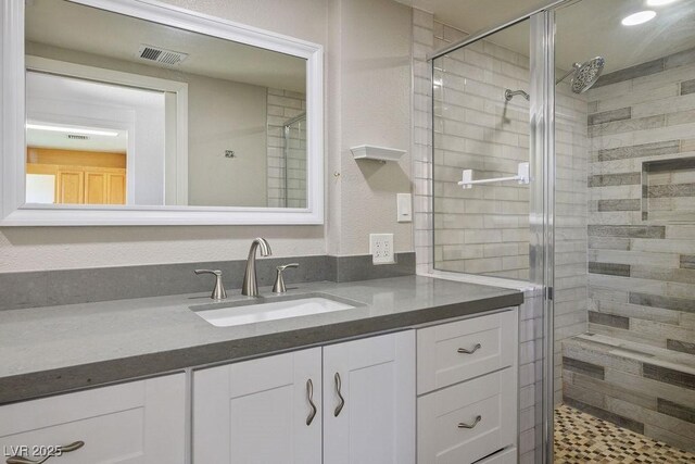 633 5th St, Boulder City, NV 89005 - bathroom with a shower stall and vanity