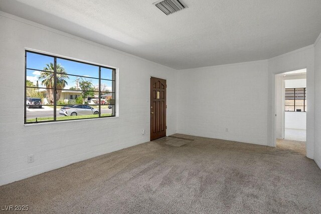 633 5th St, Boulder City, NV 89005 - unfurnished room with carpet flooring, ornamental molding, and a textured ceiling