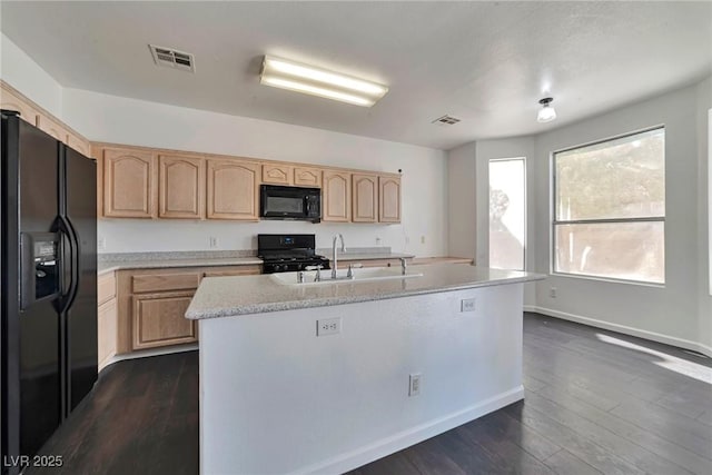 5341 Cool Dawn Ct, Las Vegas, NV 89130 - kitchen featuring black appliances, a sink, light brown cabinets, and light countertops