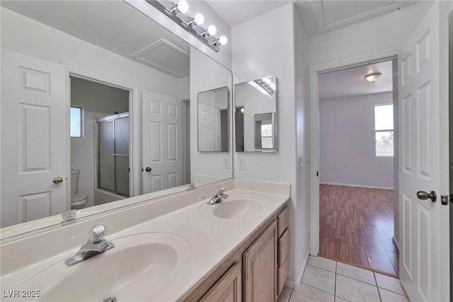 5341 Cool Dawn Ct, Las Vegas, NV 89130 - full bath with toilet, a shower with door, tile patterned floors, double vanity, and baseboards
