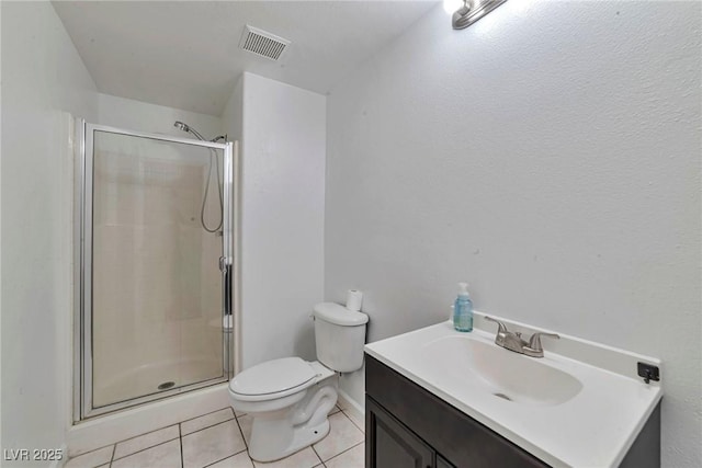 5341 Cool Dawn Ct, Las Vegas, NV 89130 - full bath with tile patterned flooring, a stall shower, toilet, and vanity