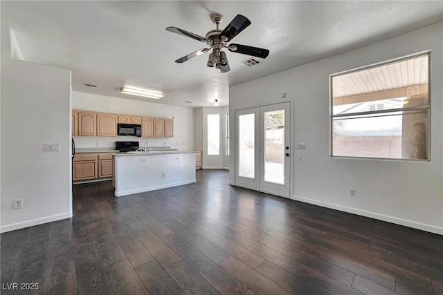 5341 Cool Dawn Ct, Las Vegas, NV 89130 - kitchen featuring black appliances, light brown cabinets, dark wood-style flooring, open floor plan, and ceiling fan