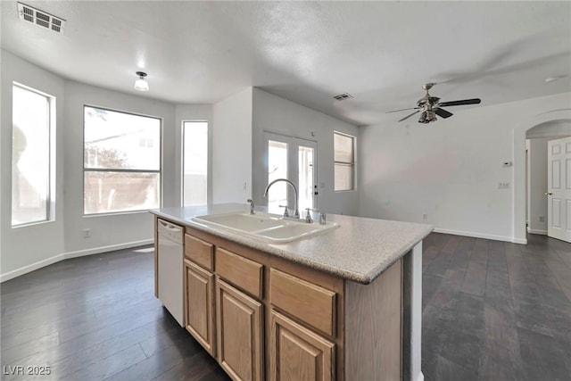 5341 Cool Dawn Ct, Las Vegas, NV 89130 - kitchen featuring a sink, dishwasher, a ceiling fan, dark wood finished floors, and baseboards