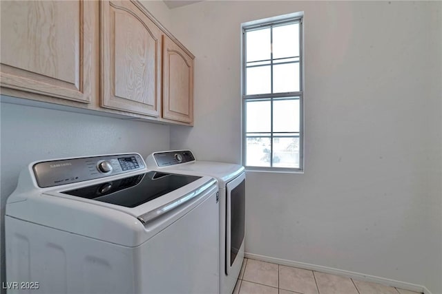 5341 Cool Dawn Ct, Las Vegas, NV 89130 - laundry room featuring washer and dryer, cabinet space, baseboards, and healthy amount of natural light
