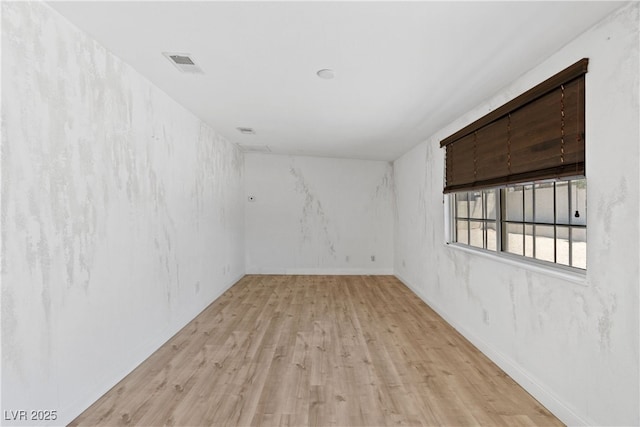 1655 E Hacienda Ave, Las Vegas, NV 89119 - spare room with light wood finished floors and baseboards