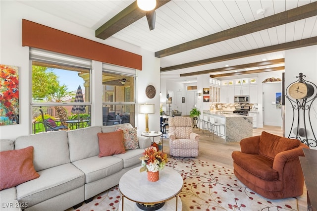 10404 Long Leaf Pl, Las Vegas, NV 89134 - living area with ceiling fan and wood ceiling with exposed beams