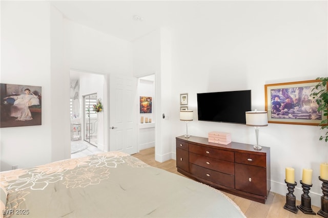 10404 Long Leaf Pl, Las Vegas, NV 89134 - bedroom featuring light wood-style flooring and baseboards