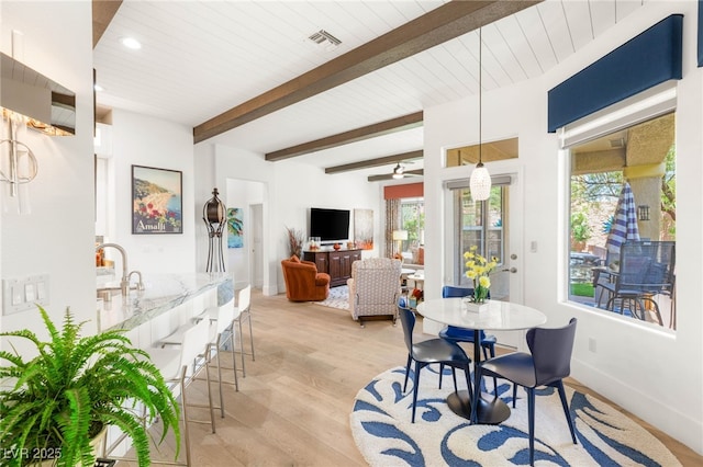 10404 Long Leaf Pl, Las Vegas, NV 89134 - dining space with baseboards, light wood-type flooring, recessed lighting, and wooden ceiling with exposed beams