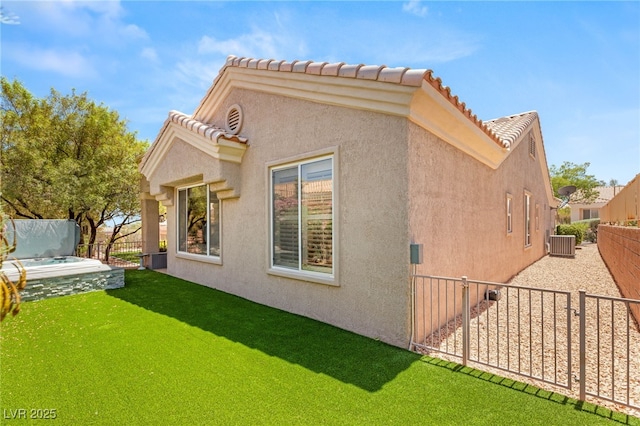 10404 Long Leaf Pl, Las Vegas, NV 89134 - rear view of house with cooling unit, stucco siding, and a tiled roof