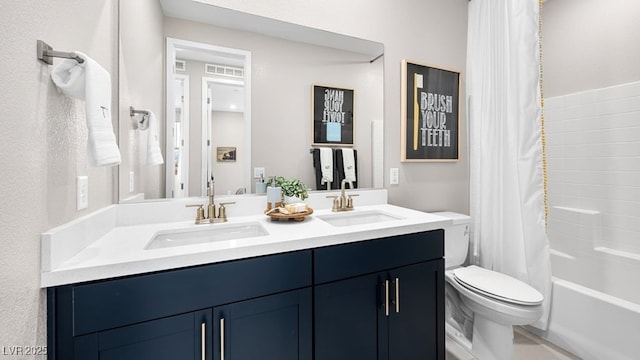 338 Taylor St, Henderson, NV 89015 - full bathroom featuring toilet, double vanity, and shower / tub combo with curtain