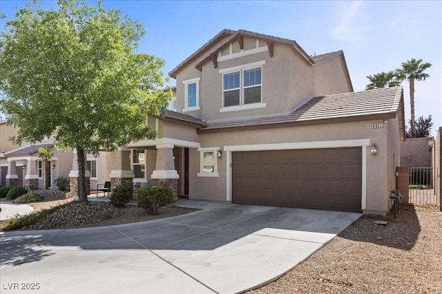 6857 Stone Tower Ct, Las Vegas, NV 89149 - craftsman-style house featuring stucco siding, concrete driveway, and a tiled roof