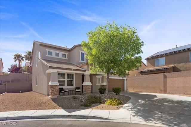 6857 Stone Tower Ct, Las Vegas, NV 89149 - view of front facade featuring stucco siding, concrete driveway, and a tile roof