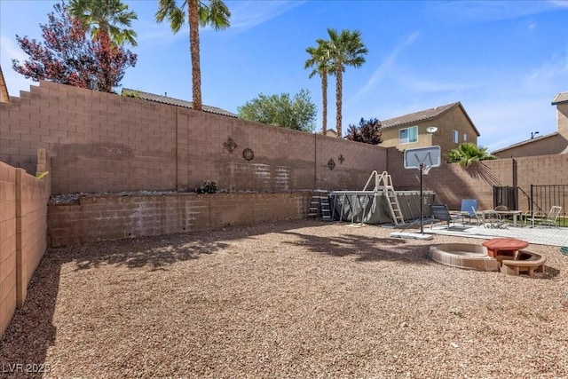 6857 Stone Tower Ct, Las Vegas, NV 89149 - fenced backyard featuring a patio area