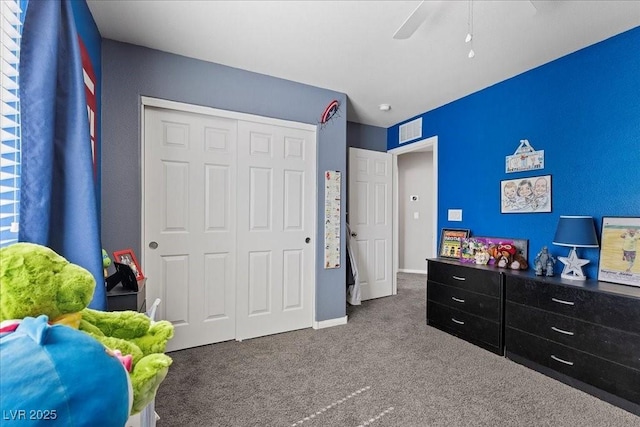 6857 Stone Tower Ct, Las Vegas, NV 89149 - carpeted bedroom featuring a closet, ceiling fan, and baseboards