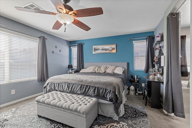 6857 Stone Tower Ct, Las Vegas, NV 89149 - bedroom with carpet floors, a ceiling fan, and baseboards