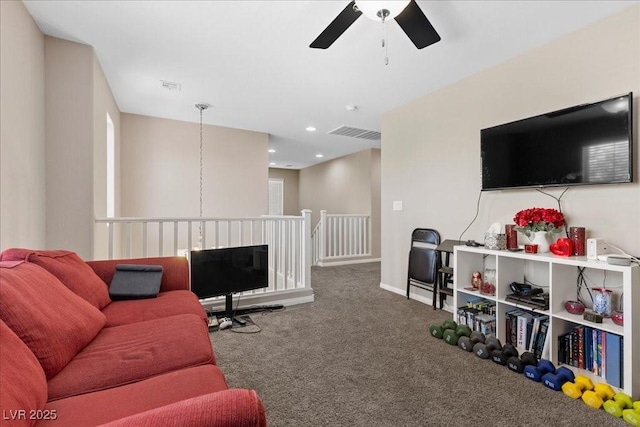 6857 Stone Tower Ct, Las Vegas, NV 89149 - carpeted living room featuring a ceiling fan and baseboards