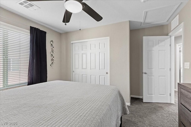 6857 Stone Tower Ct, Las Vegas, NV 89149 - carpeted bedroom featuring a closet, attic access, baseboards, and ceiling fan