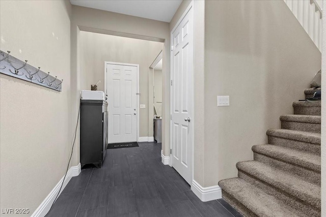 6857 Stone Tower Ct, Las Vegas, NV 89149 - corridor featuring stairs and baseboards