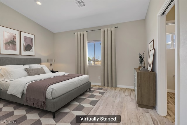 2130 Revere St, North Las Vegas, NV 89030 - bedroom featuring light wood-style floors and recessed lighting