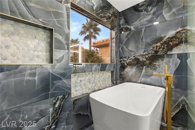 1613 Shadow Rock Dr, Las Vegas, NV 89117 - full bath with tile walls and a freestanding tub