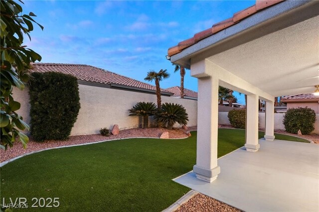 1613 Shadow Rock Dr, Las Vegas, NV 89117 - view of yard featuring a patio