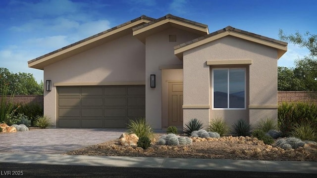 4180 E Brusca Way, Pahrump, NV 89061 - view of front facade with stucco siding, a garage, and driveway