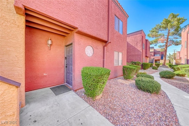 4050 Pacific Harbors Dr Unit 107, Las Vegas, NV 89121 - property entrance with stucco siding