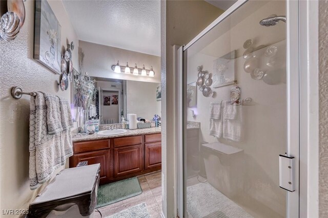 4050 Pacific Harbors Dr Unit 107, Las Vegas, NV 89121 - full bath featuring a shower stall and vanity