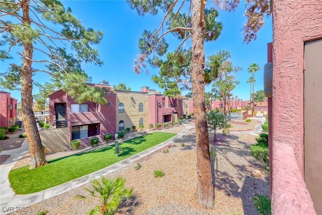 4050 Pacific Harbors Dr Unit 107, Las Vegas, NV 89121 - view of property's community featuring a residential view and a yard