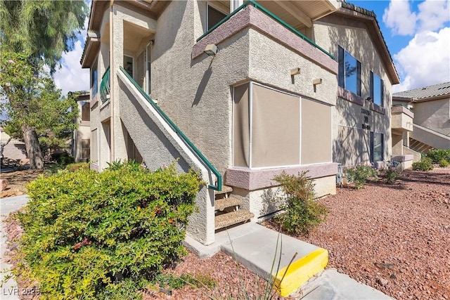 5710 E Tropicana Ave Unit 2152, Las Vegas, NV 89122 - view of side of property with stucco siding