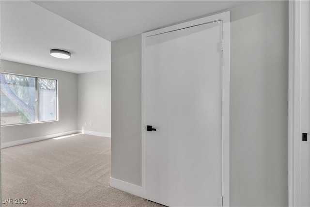 5710 E Tropicana Ave Unit 2152, Las Vegas, NV 89122 - empty room featuring baseboards and carpet