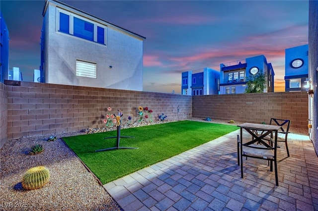 8178 Eaton Hill St, Las Vegas, NV 89113 - fenced backyard with a patio area
