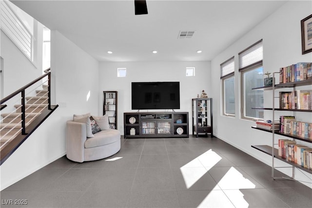 8178 Eaton Hill St, Las Vegas, NV 89113 - tiled living area featuring stairway and recessed lighting