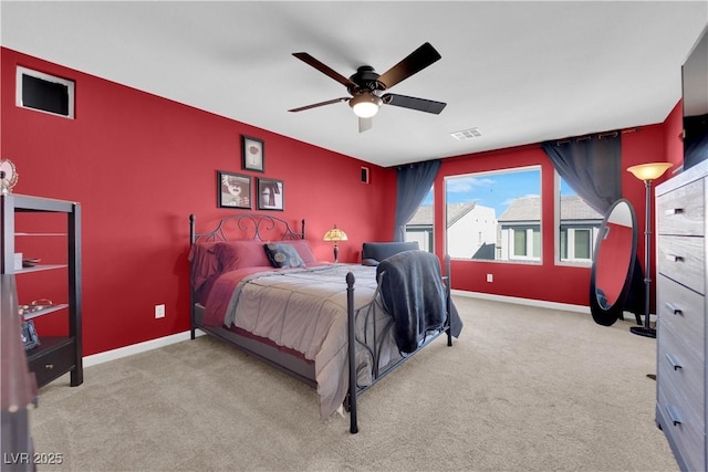 8178 Eaton Hill St, Las Vegas, NV 89113 - carpeted bedroom with an accent wall and a ceiling fan