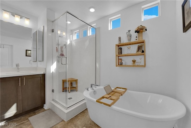 8178 Eaton Hill St, Las Vegas, NV 89113 - full bathroom with vanity, a shower stall, and a freestanding tub