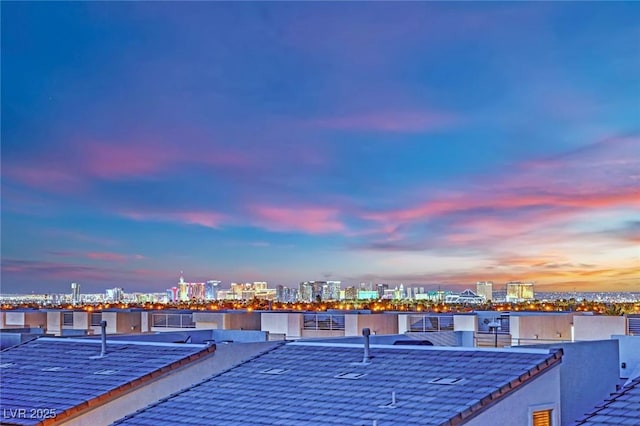 8178 Eaton Hill St, Las Vegas, NV 89113 - exterior view of a tile roof and a view of city