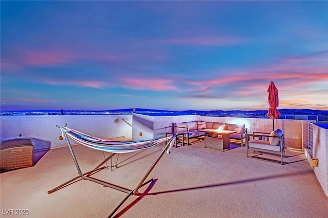 8178 Eaton Hill St, Las Vegas, NV 89113 - view of patio with a water view and an outdoor fire pit
