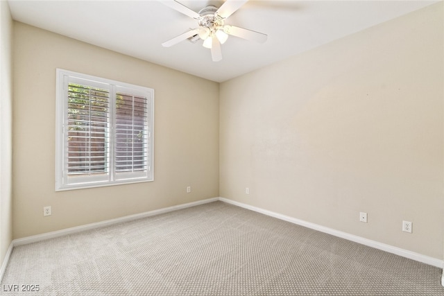 11177 Twilight Times Ct, Las Vegas, NV 89135 - carpeted spare room with baseboards and a ceiling fan