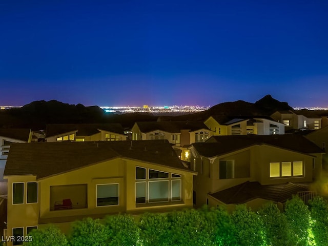 3 Hilltop Crest St, Henderson, NV 89011 - back of house at dusk with stucco siding