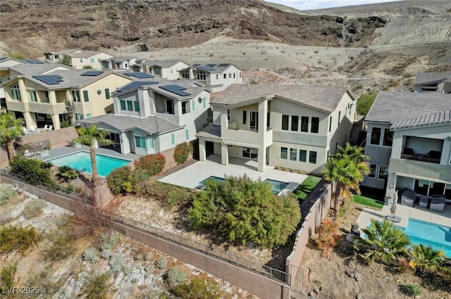 3 Hilltop Crest St, Henderson, NV 89011 - aerial perspective of suburban area with a pool and mountains