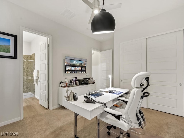 3 Hilltop Crest St, Henderson, NV 89011 - office area featuring light colored carpet, ceiling fan, and baseboards