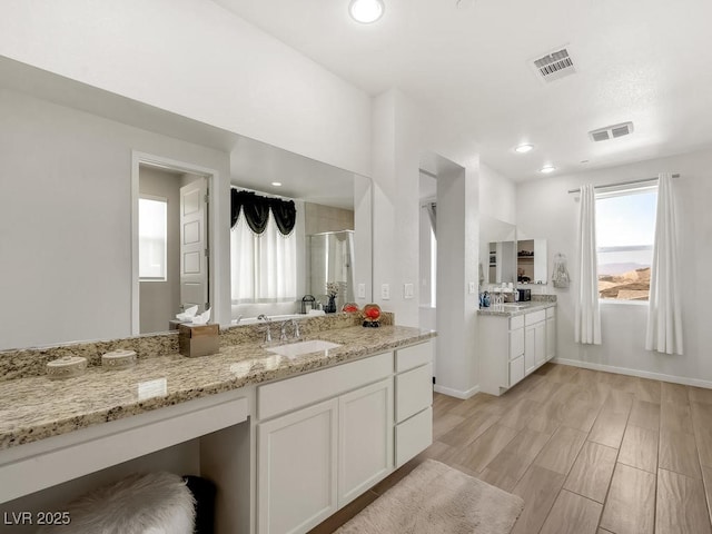 3 Hilltop Crest St, Henderson, NV 89011 - full bath featuring a stall shower, vanity, wood finished floors, recessed lighting, and baseboards
