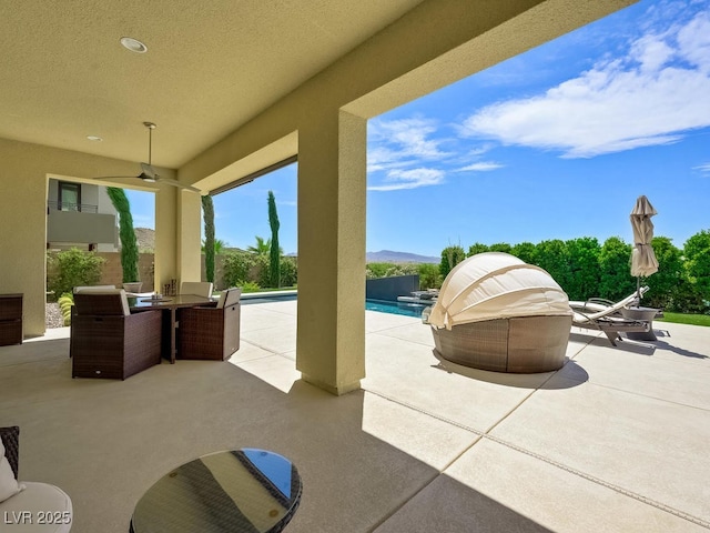 3 Hilltop Crest St, Henderson, NV 89011 - view of patio / terrace with an outdoor pool and a ceiling fan