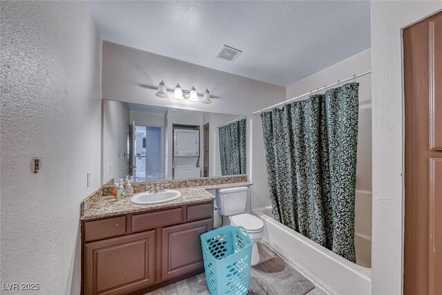 4050 Pacific Harbors Dr Unit 245, Las Vegas, NV 89121 - bathroom featuring shower / tub combo, vanity, a textured wall, and toilet